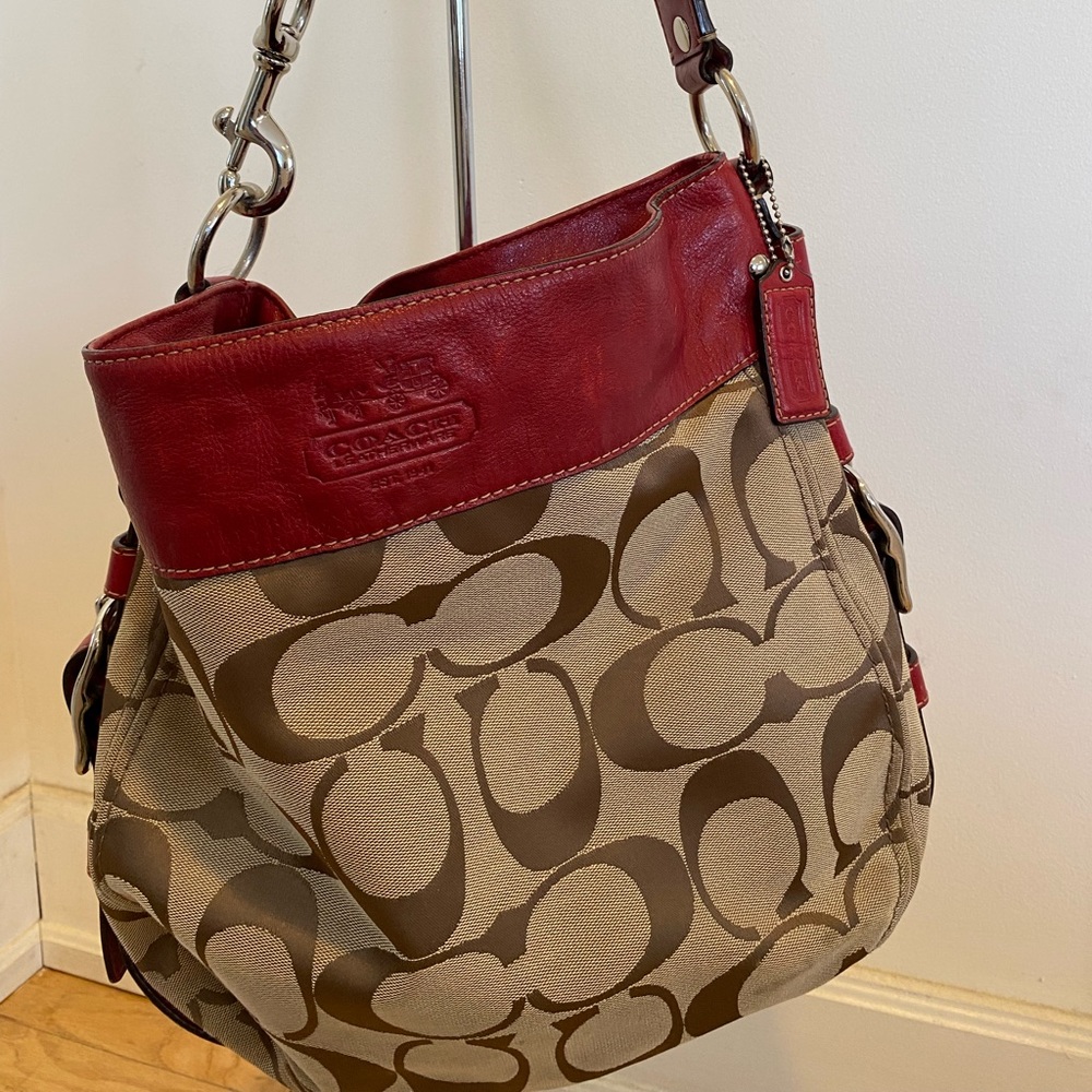 Signature Coach bag with red leather trim. - Picture 1 of 4
